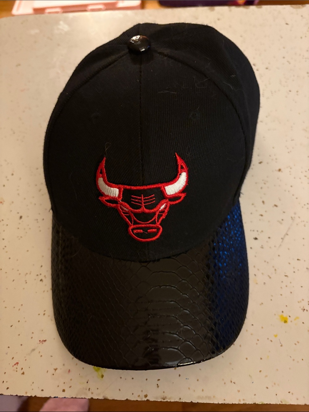 Black Baseball Cap with Red Embroidered Bull Logo